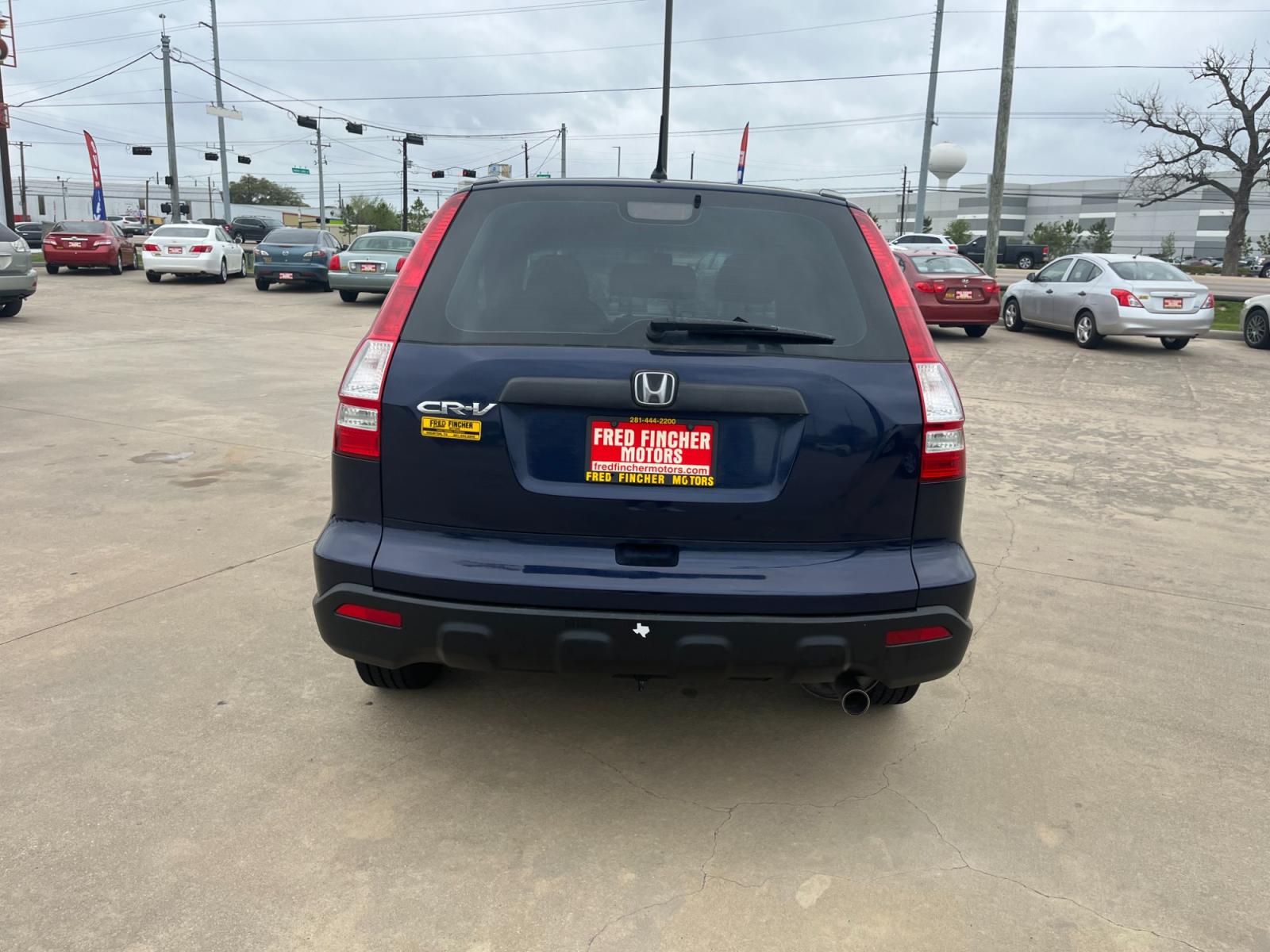 2008 blue /black Honda CR-V LX 2WD AT (3CZRE38348G) with an 2.4L L4 DOHC 16V engine, 5-Speed Automatic Overdrive transmission, located at 14700 Tomball Parkway 249, Houston, TX, 77086, (281) 444-2200, 29.928619, -95.504074 - Photo #5